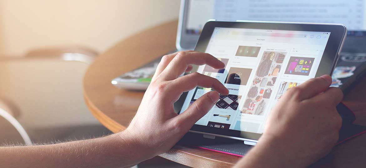 Person Working on iPad Person Working on iPad